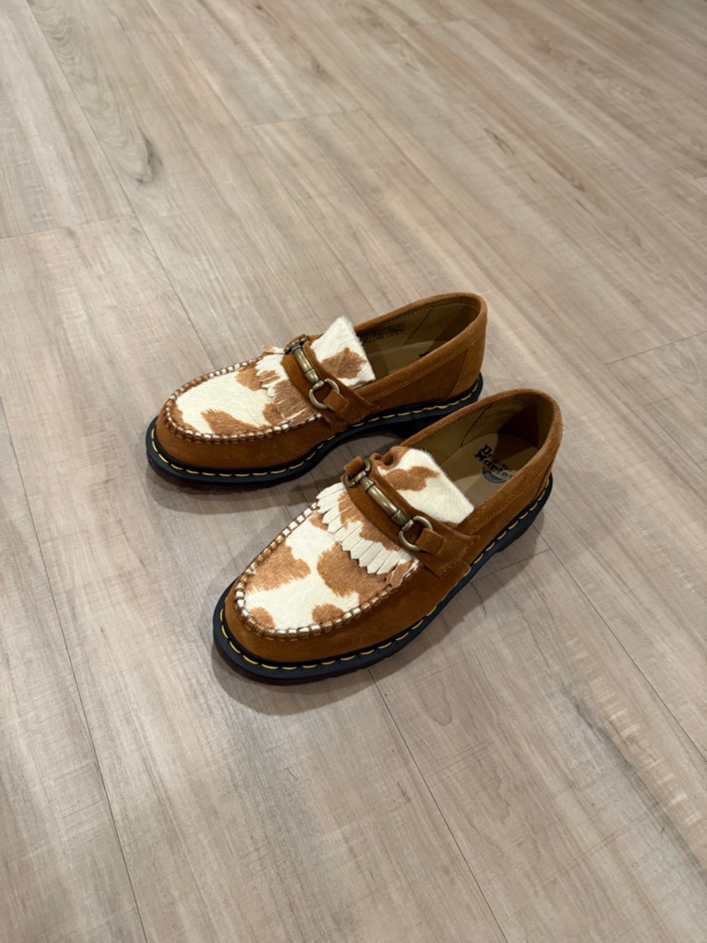 DR. MARTENS ADRIAN SNAFFLE HAIR-ON COW PRINT KILTIE LOAFERS